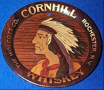 Image of Wolcott Distillery serving tray with Cornhill Whiskey and picture of an American Indian
