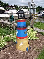 Picture of one shed that is a decorative lighthouse