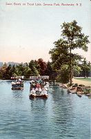 Picture of a postcard that shows the swan boats at Seneca Park