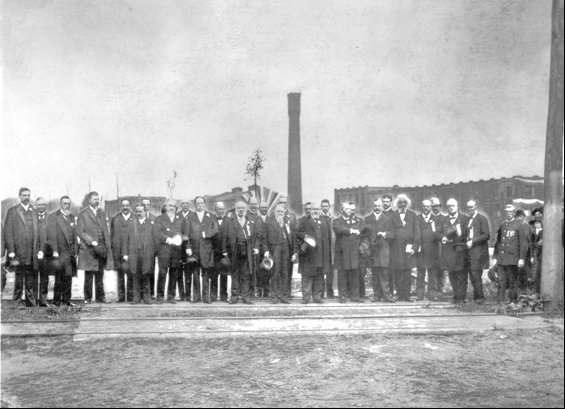 Picture of a group of dignitaries at the location of the Eastman Memorial