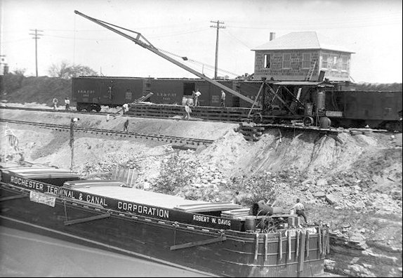 Picture showing a barge being loaded