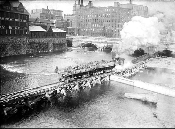 Image of the railroad trestle to remove rubble.