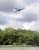 A helicopter lowering the decking