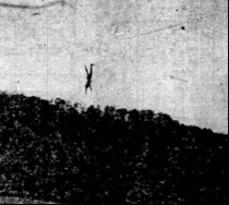 Picture of wire walker, possibly doing hand stand